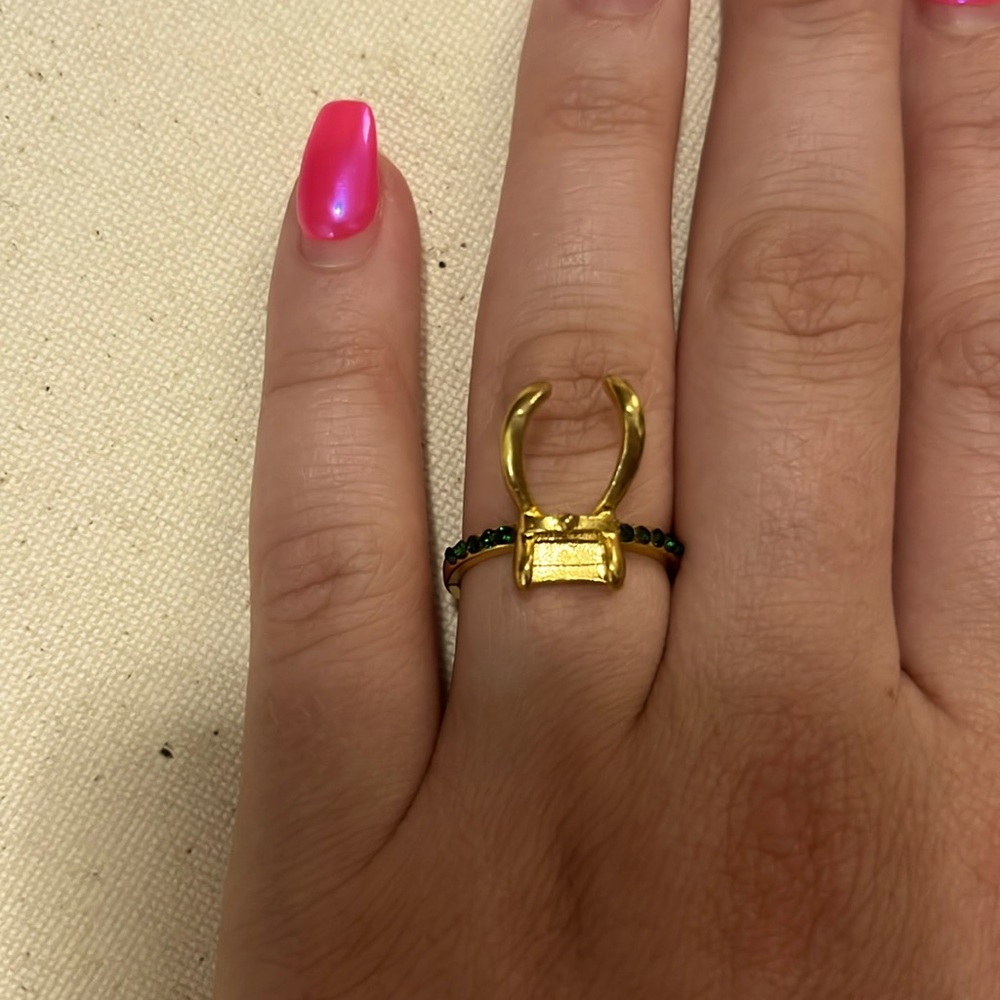 loki gold and green ring